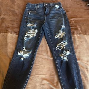 dark blue ripped American Eagle jeans